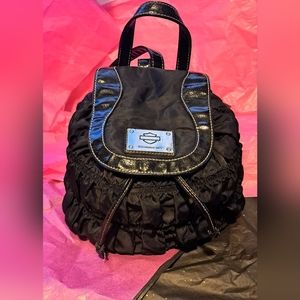 Backpack and small handbag